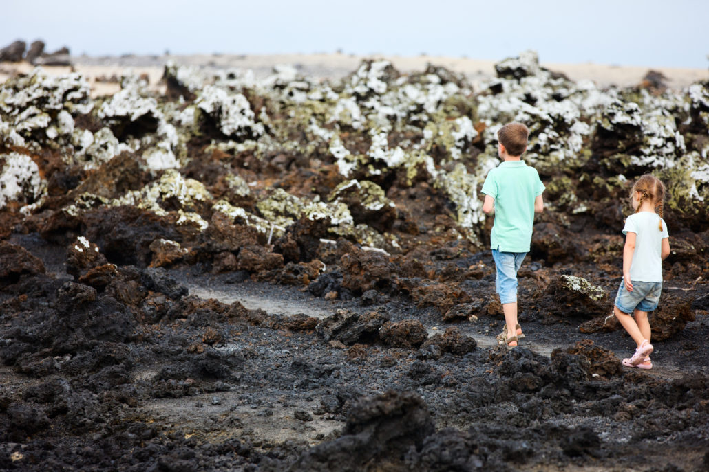 Kids walking on the Galapagos Islands