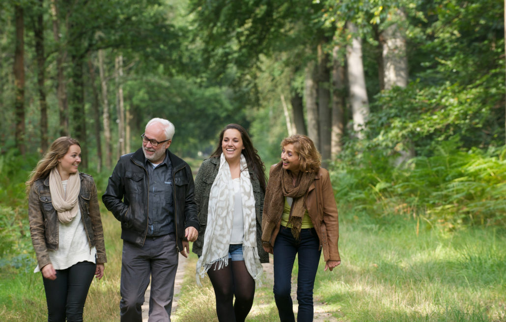 family walk in the woods