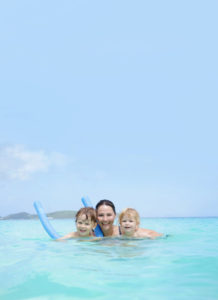 Family swimming in Riviera Maya, Mexico 