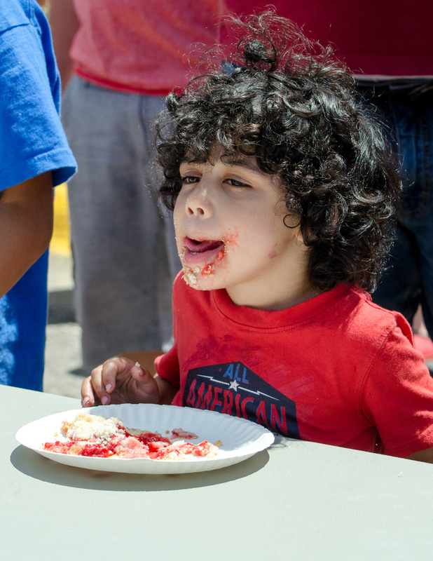 Pie eating contest at cherry festival