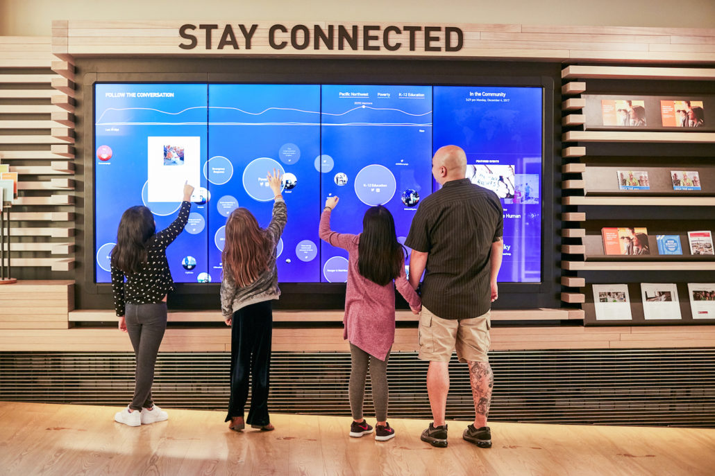 Visitors interact with the exhibits at the Bill & Melinda Gates Foundation Discovery Center in Seattle, WA. Photo: Visit Seattle